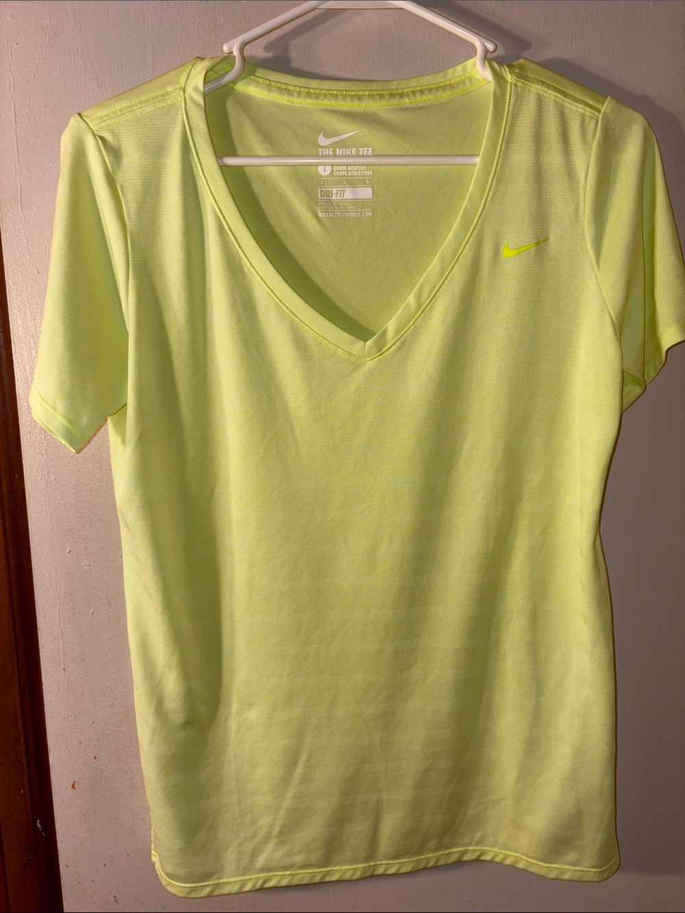 Nike Women's Short-Sleeve V-Neck Tee in Neon Yellow